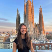 Posing for a picture at sunset with an incredible view of La Sagrada Familia