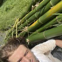 Being proud of the bamboo we collected 