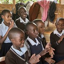 Students singing in the classroom