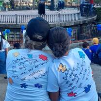 Taking part in a March supporting Autism