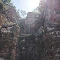 At the feet of the Buddha