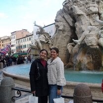 My friend and I in front of a fountain after attending Mass said by the Pope!