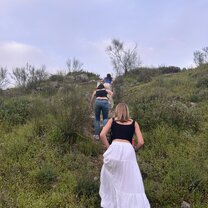 Hiking up a mountain to see the sunset over Toledo