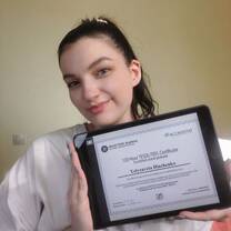 Happy owner of her first teaching certificate