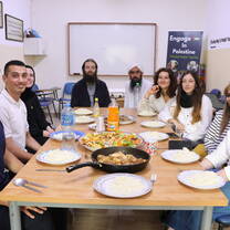 Eating dinner at the center. 