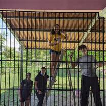Me and my fellow Glimpsers installing netting for our CAP, so the kids won't throw toys outside!