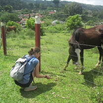 My friend and a horse right down the road from  the home we stayed at. 