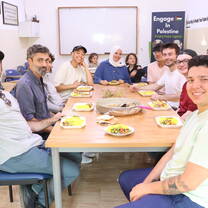 Eating dinner with friends at the centre- we also learnt how to cook Palestinian dishes!