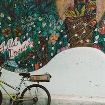Beautiful mural with a bike parked right in front