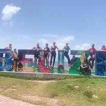 Group photo by the Belize sign 