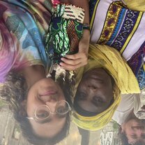 Learning how to basket weave with a local woman in the Kairo village