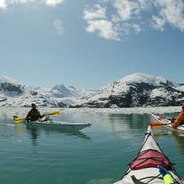 Kayaking by a glacier