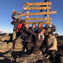 Climbing Mt. Kilimajaro with GIVE volunteers and Green Paw Adventures!