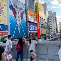 Glico Dotonbori Sign and me posing next to it in Dotonbori!