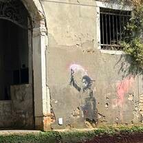 Close up of Banksy 