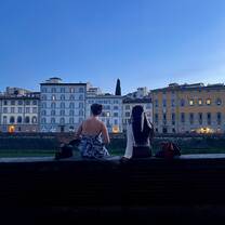 Enjoying Sunset by the Arno River