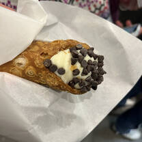 A Cannoli from Gino's Bakery in Florence, gifted by a CIS ambassador on a tour through the best dining spots in Florence
