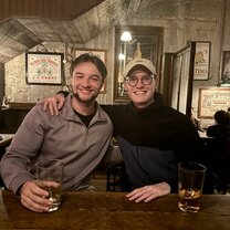 This is me with one of the locals named Joe. He was extremely friendly and what started as one conversation turned into a new friendship!