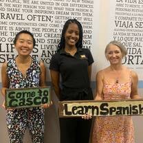 With teacher Massiel and a fellow student