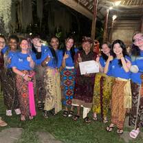 A photo of my housemates and our homestay dad at our leaving ceremony.