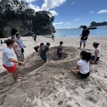 Me and other TEAN students digging a hole