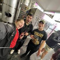 Fellow TEAN members, Alex and Michael and I drinking wine at Waiheke Island