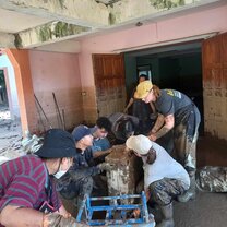 Cleaning out flooded basement of the animal shelter