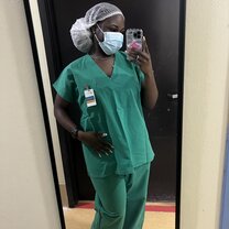 A picture of me before entering a public hospital's recovery room/ICU, where I shadowed physicians.