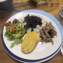 A picture of a dinner prepared by my host mother, mirroring how diverse and hearty most of our dinners were. 