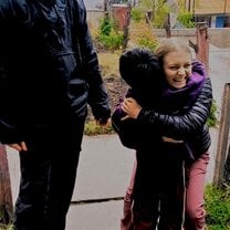 Me and my best friend I made on program with one of our new friends from a village we visited. 