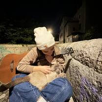 When walking up to the Bastille on the stair path there is this little alcove where you might find this furry guy :)