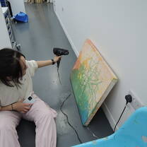Working on the painting