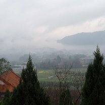 View from a temple above the misty lake.