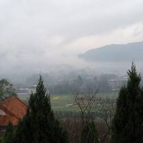 View from a temple above the misty lake.