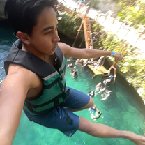 Jumping into the Sayab Kuxtal cenote