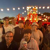 With the CRCC Asia crew and fellow attendees at a social event .