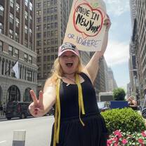 I rallied for the Garment District in Times Square during my AIFS internship 