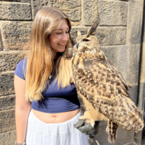 Ainsley Braun holding an owl in Edinburgh, Scotland, May 2025 