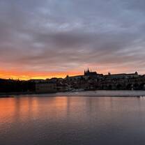 Sunset above the Vltava River (palace in the distance)