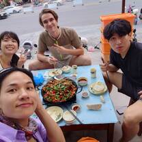 Typical dish with local friends after climbing