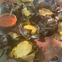 Tamales that we helped prepare, cooked in traditional Pib