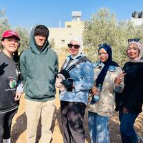 This was when the group picked Olives on a farm in Dura!
