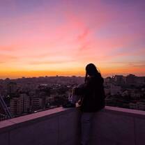 Sunset on the 10th floor of the center's apartment building for the girls