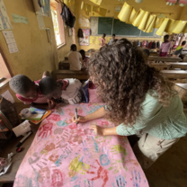 Making a poster with all the hands of the students in the class.