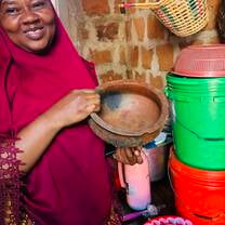Biasina in her kitchen, home visit