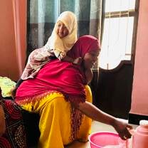 Biasina and daughter, home visit