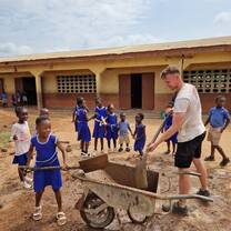 Some of the children helping me build their new school!