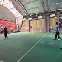 Me playing badminton with some locals 