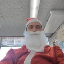 Dressing up as Santa for the kids 