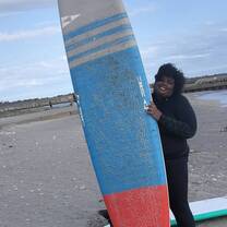Surfing on a windy beach